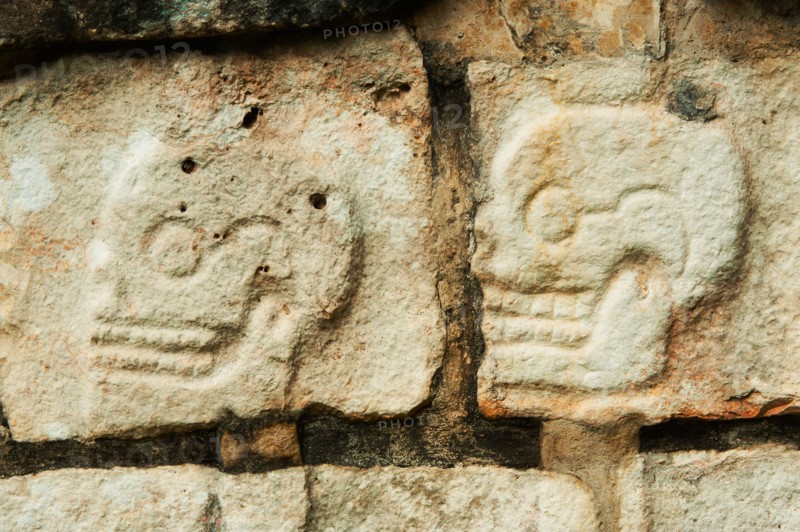 Mexico, Yucatan, Chichen Itza. Mayan carvings representing human skulls.
