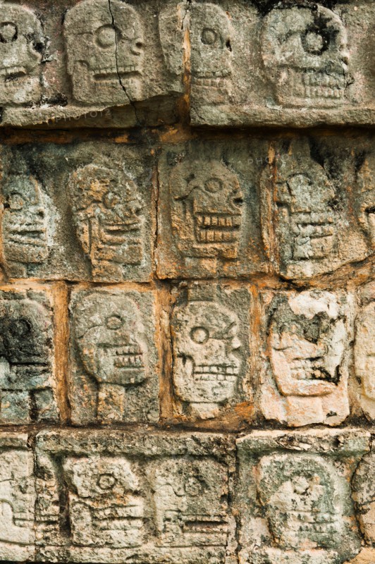 Mexico, Yucatan, Chichen Itza. Mayan carvings representing human skulls.