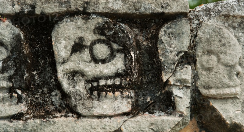 Mexico, Yucatan, Chichen Itza. Mayan carvings representing human skulls.