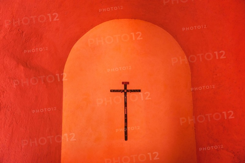 Mexico, Yucatan, Valladolid. Valladolid, Crucifix on wall.