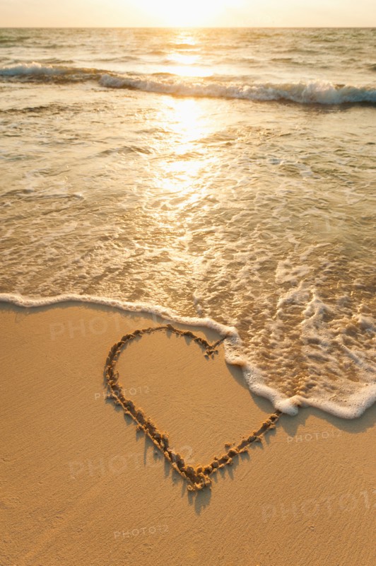 Mexico, Yucatan. Heart drawn in sand on beach.