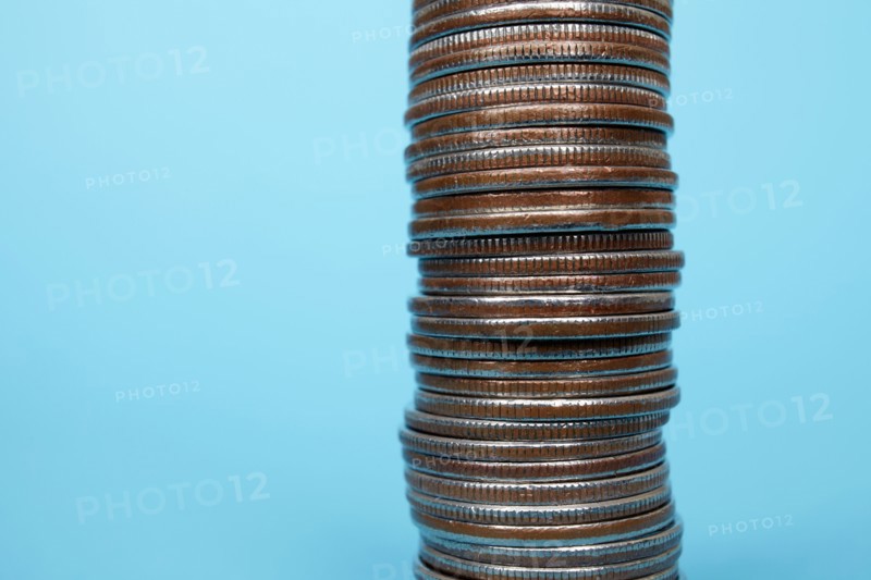 Studio shot of stack of coins. Photo : Winslow Productions