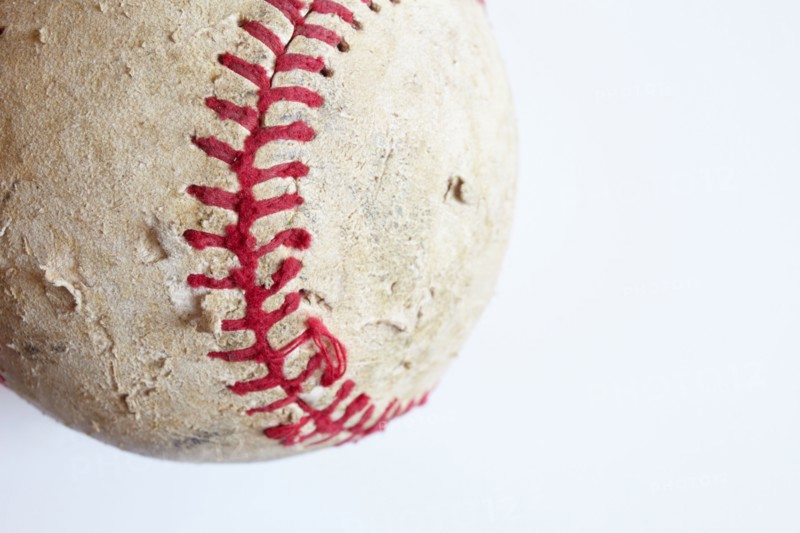 Studio shot of old baseball ball. Photo : Winslow Productions