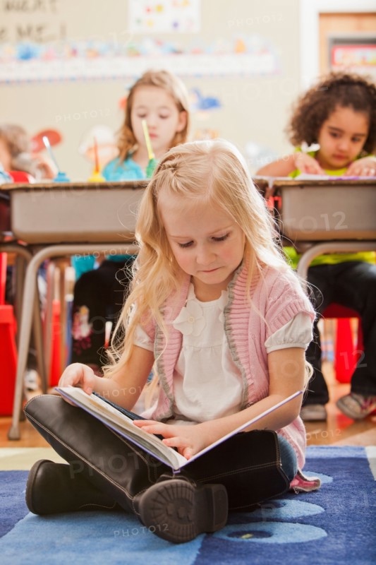 Children (2-3, 4-5, 6-7) at school. Photo : Mike Kemp