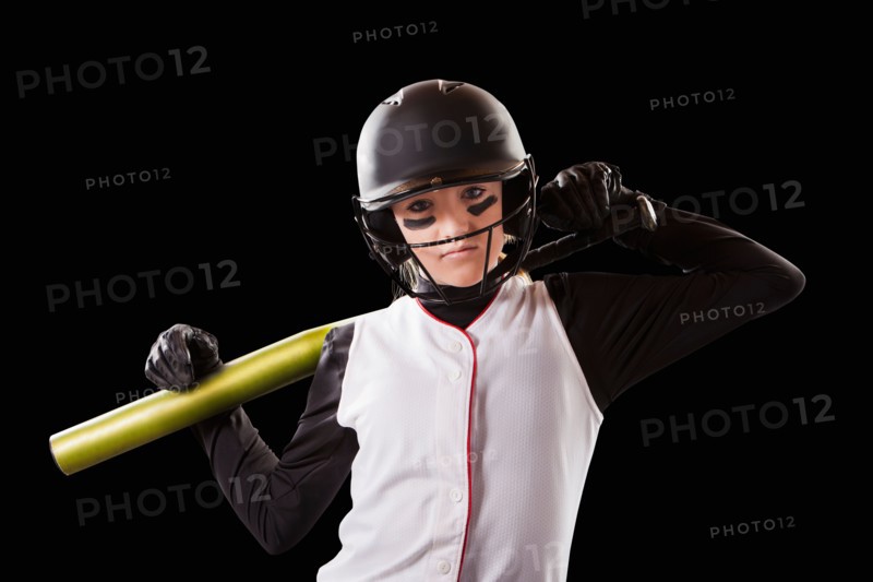 Portrait of girl (12-13) plying softball. Photo : Mike Kemp