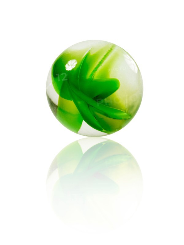 Studio shot of green marbles arranged in Exclamation Point. Photo : David Arky