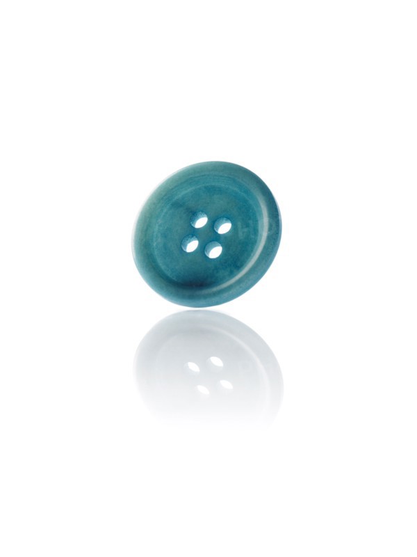 Studio shot of green marbles arranged in Exclamation Point. Photo : David Arky