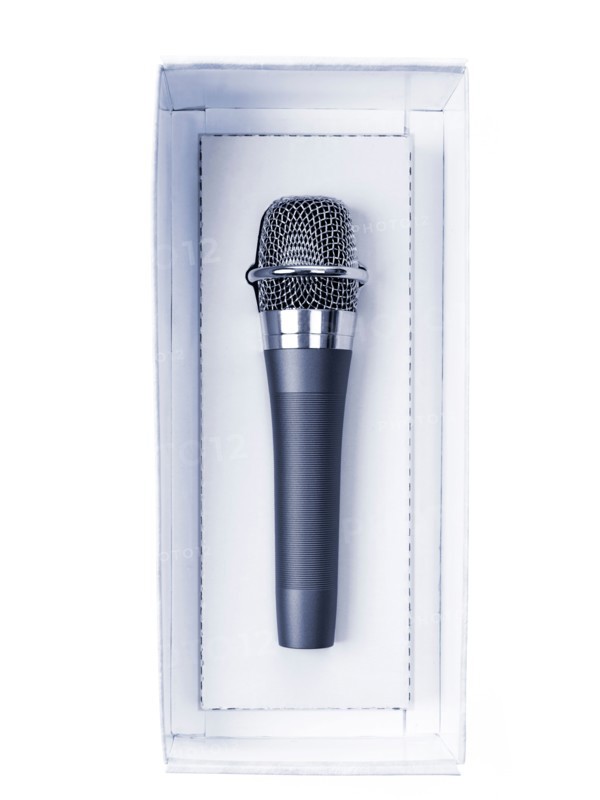 Studio shot of unplugged microphone still in box. Photo : David Arky