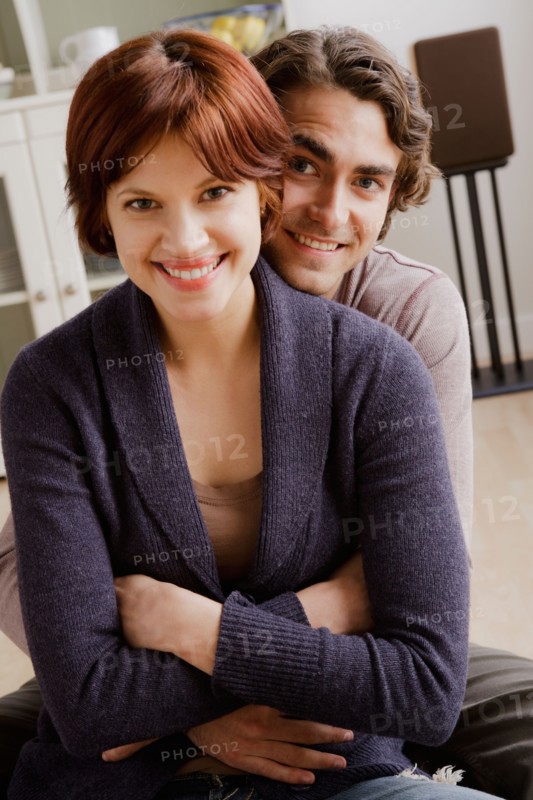 Portrait of smiling couple. Photo : Rob Lewine
