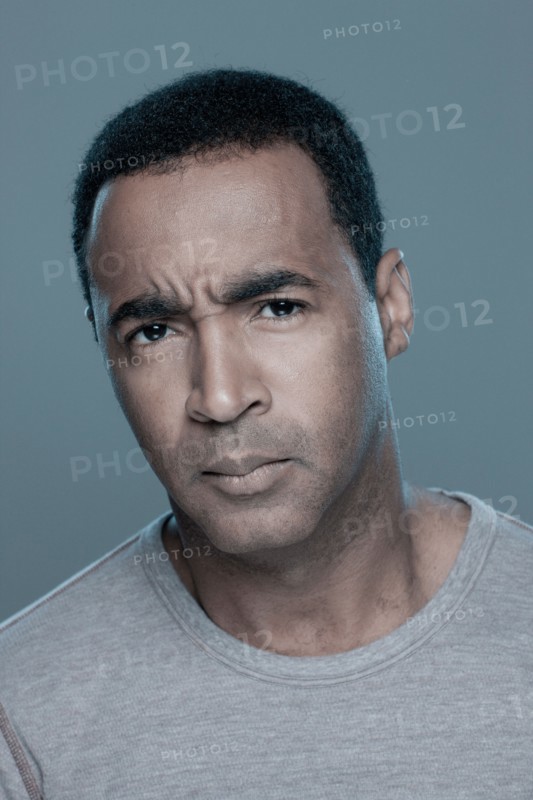 Studio shot of confused man. Photo : Rob Lewine