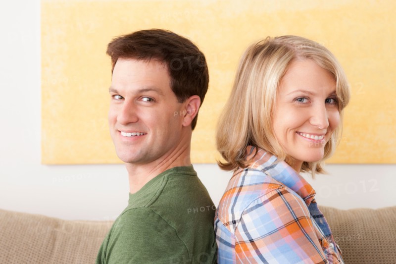 Portrait of smiling mid adult couple. Photo : Rob Lewine