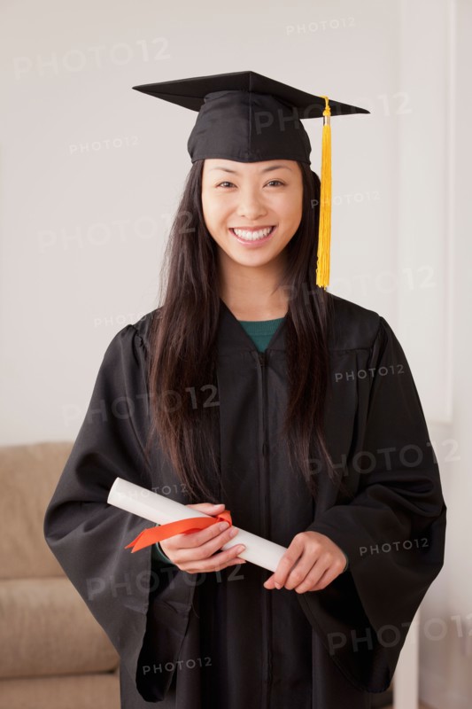 Portrait of graduated young woman. Photo : Rob Lewine