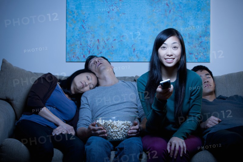Family watching TV . Photo : Rob Lewine
