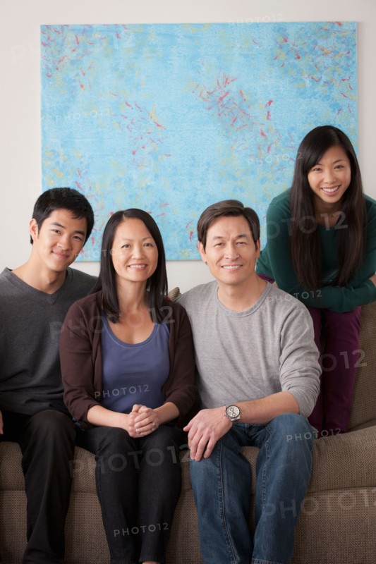 Portrait of smiling family. Photo : Rob Lewine