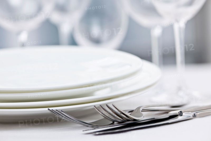 Dishes and cutlery prepared for meal. Photo : Elena Elisseeva