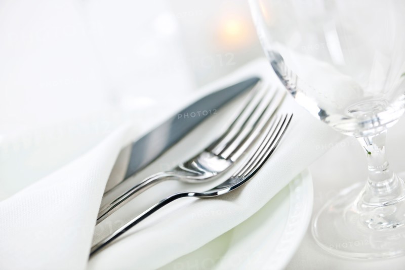 Dishes and cutlery prepared for meal. Photo : Elena Elisseeva
