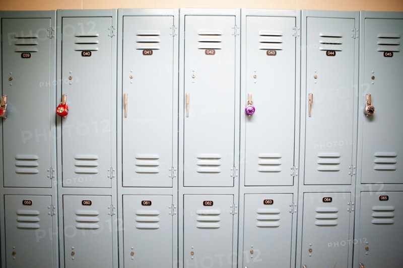 Row of lockers with different padlocks. Photo : Jessica Peterson
