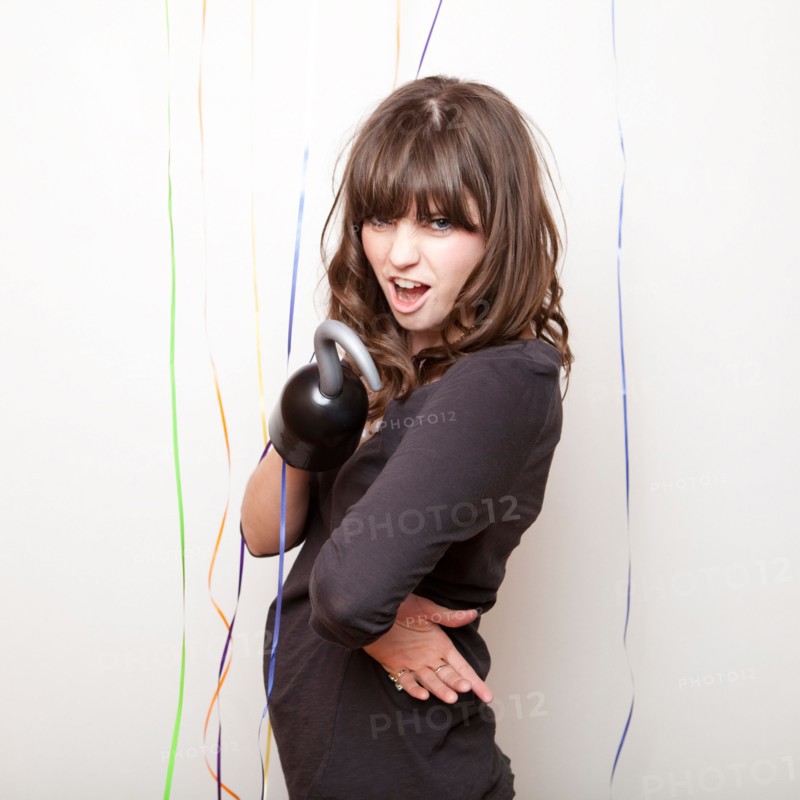 Studio Shot of young woman with hook. Photo : Jessica Peterson