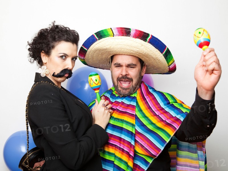 Studio Shot of two people dressed up as Mexicans. Photo : Jessica Peterson