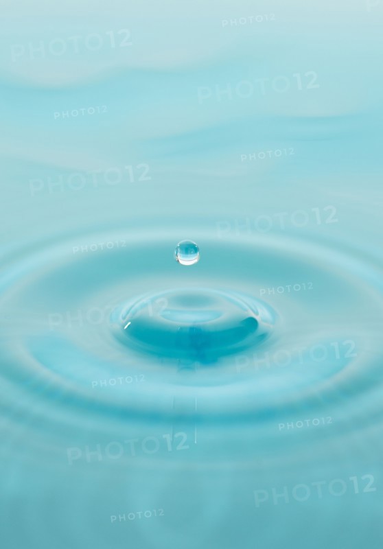 Drop falling into water.