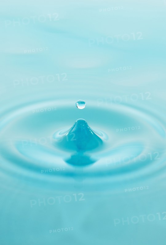 Drop falling into water.