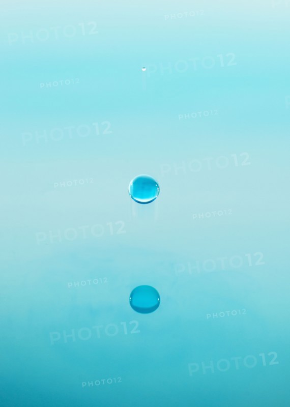 Drop falling into water.