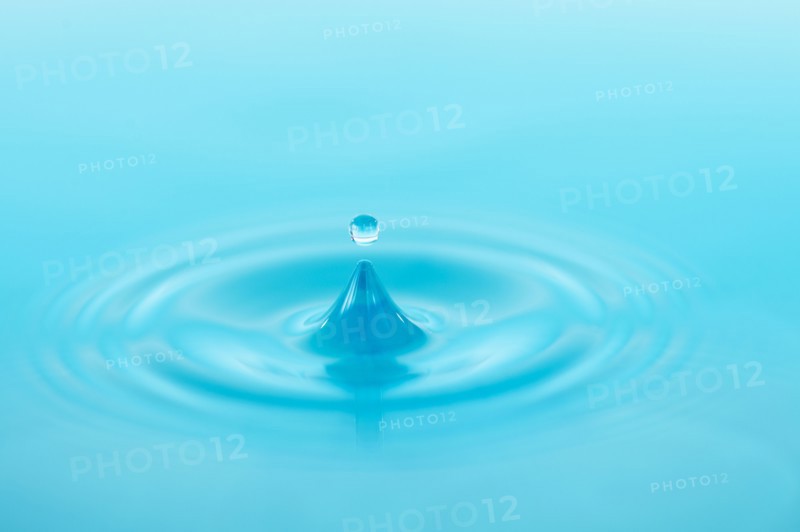Drop falling into water.