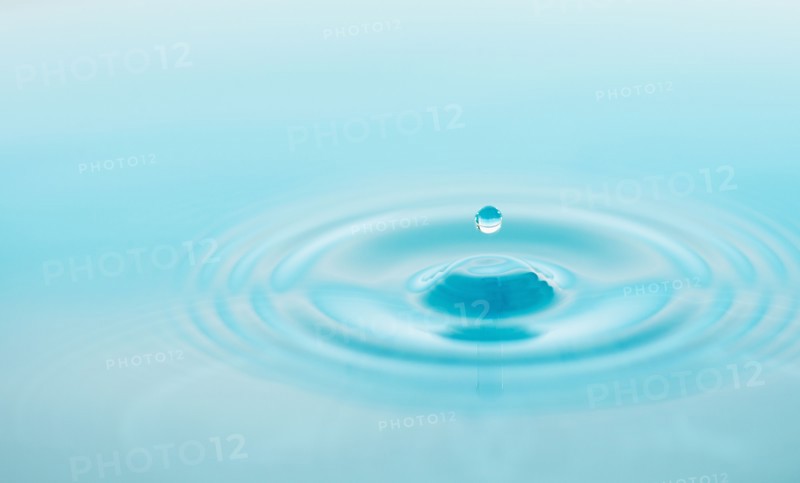 Drop falling into water.