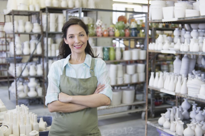 Woman in pottery warehouse.