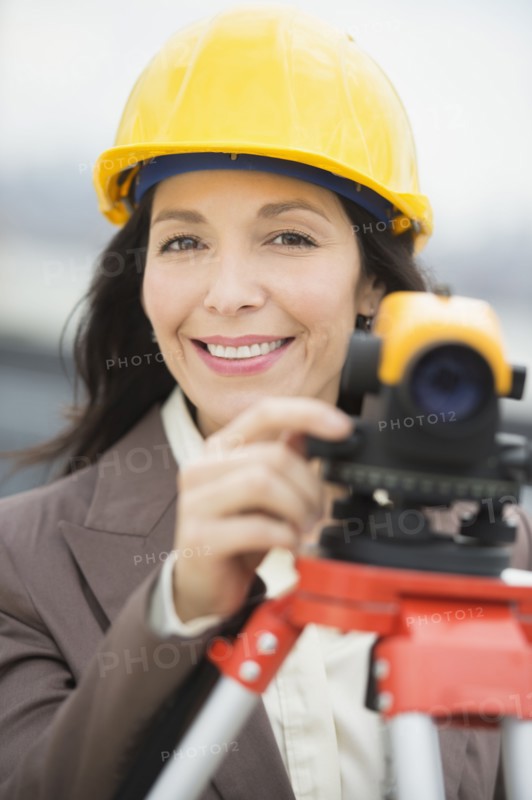 Architect using theodolite.