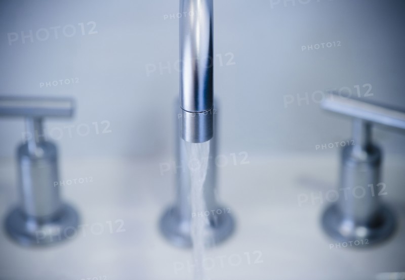 Water flowing from faucet. 
Photo : Jamie Grill