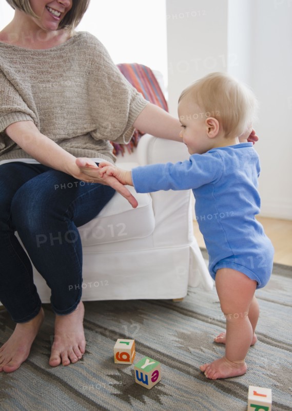 Mother with son (6-11 months) at home. 
Photo: Jamie Grill