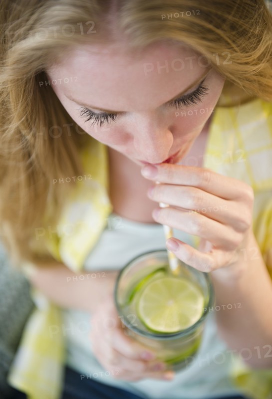 Woman drinking water. 
Photo: Jamie Grill