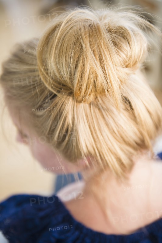 Elevated view of woman with hair bun. 
Photo: Jamie Grill