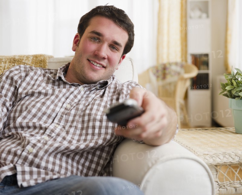 man watching tv. 
Photo: Jamie Grill