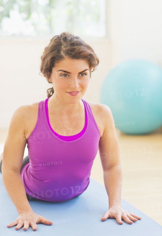 Woman practicing yoga. 
Photo : Daniel Grill