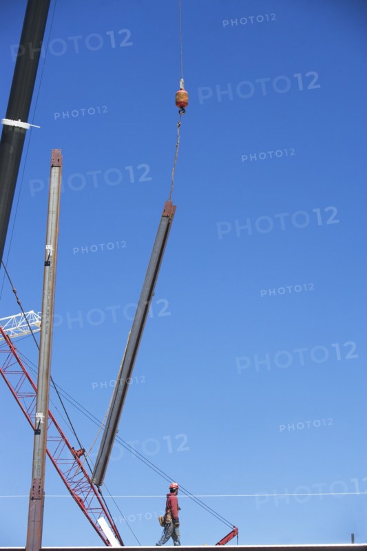 Construction worker on construction frame. 
Photo: fotog