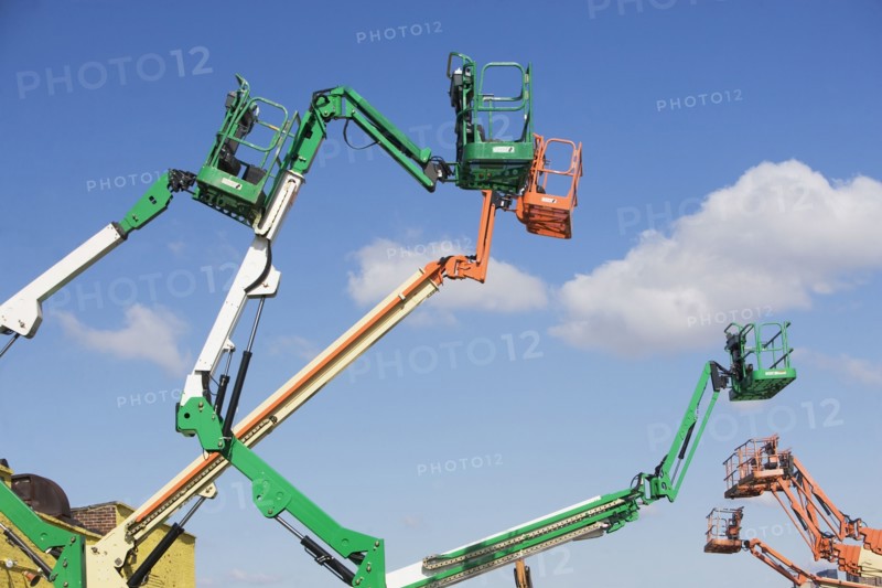 Cherry pickers on construction site. 
Photo: fotog