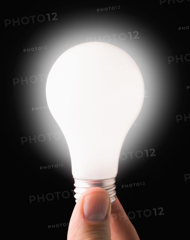 Close-up of lit light bulb. 
Photo: Mike Kemp