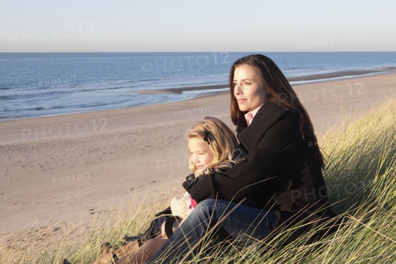 Netherlands, Zeeland, Haamstede, Mother with daughter on beach. 
Photo: Jan Scherders