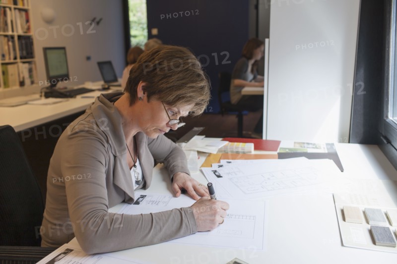 Employees of design agency at work. 
Photo: Jan Scherders