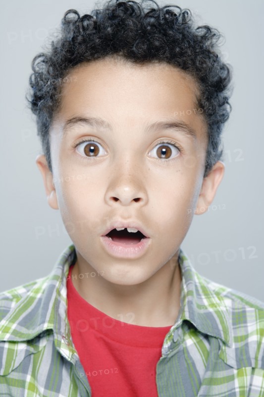 Portrait of boy (8-9), studio shot. 
Photo: Rob Lewine