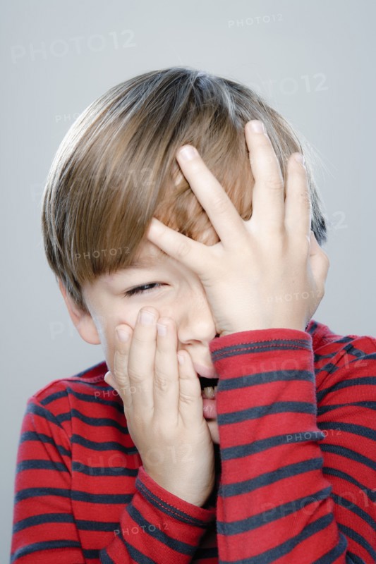 Portrait of boy (6-7), studio shot. 
Photo : Rob Lewine