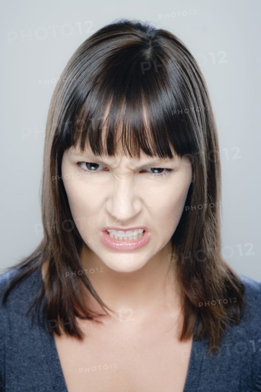 Portrait of young woman, studio shot. 
Photo : Rob Lewine