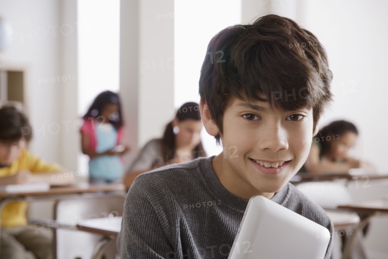 Portrait of schoolboy (12-13). 
Photo : Rob Lewine