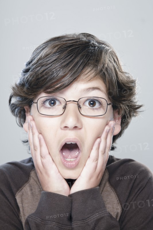 Portrait of boy (10-11), studio shot. 
Photo : Rob Lewine