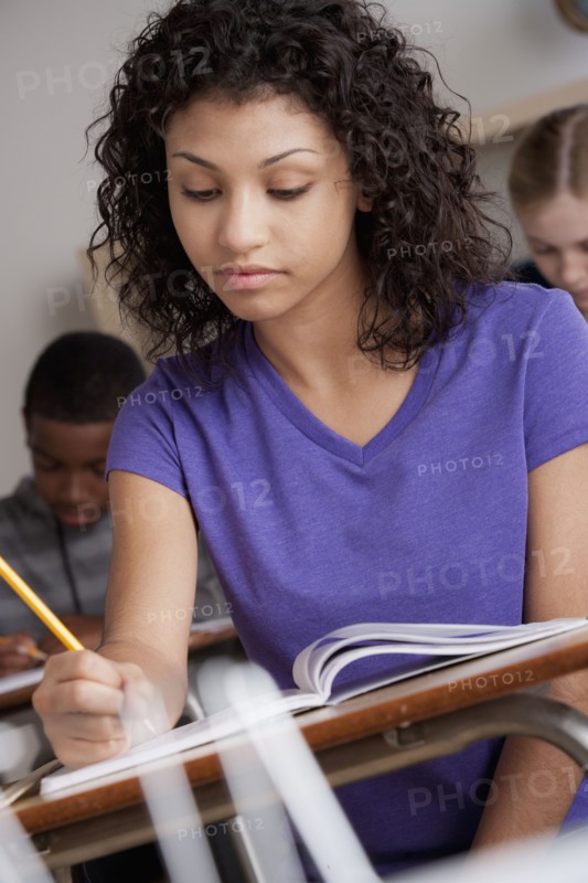 Teenage students (14-15, 16-17) at school. 
Photo : Rob Lewine