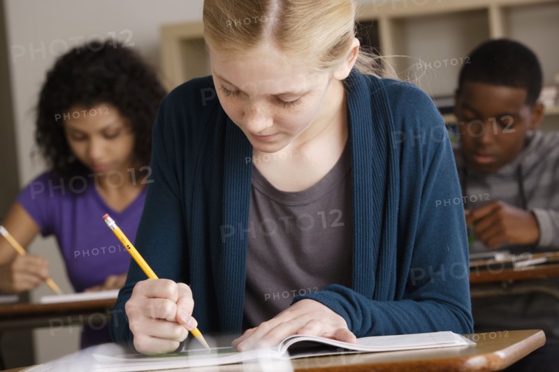 Teenage students (14-15, 16-17) at school. 
Photo : Rob Lewine