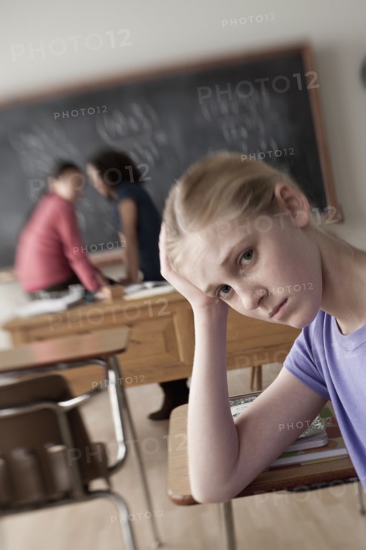 Teenage girls (14-15, 16-17) at school. 
Photo : Rob Lewine