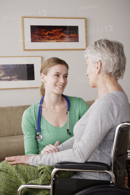 Young female nurse taking care of senior woman. 
Photo: Rob Lewine
